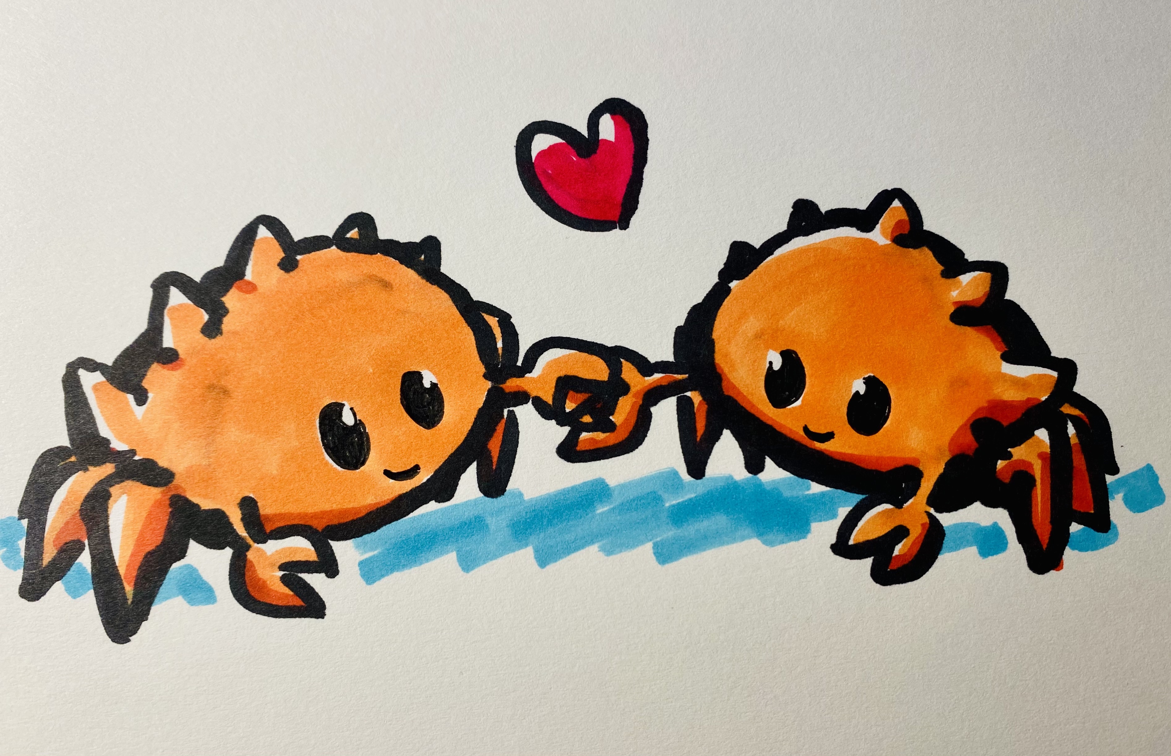 Two ferris crabs holding hands (well, claws) with a heart overhead